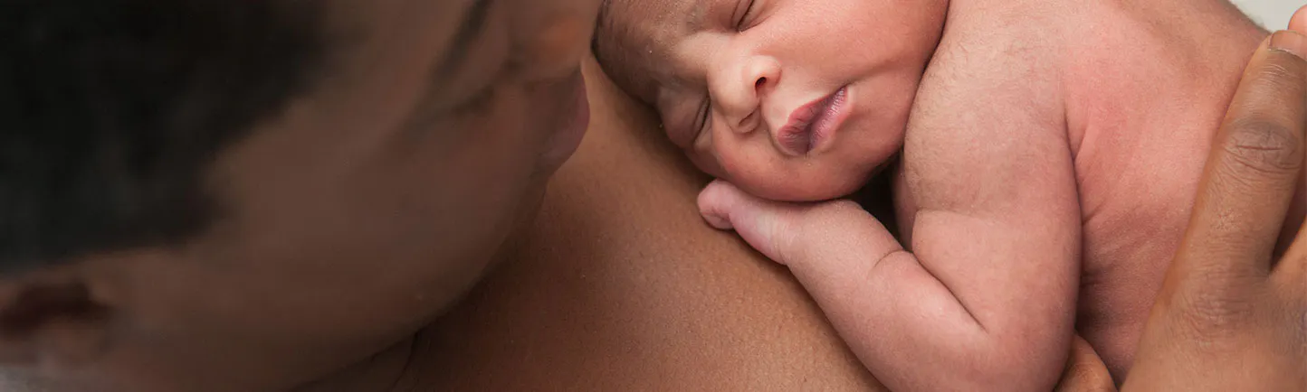 Mom and newborn skin-to-skin at the Family Birth Center
